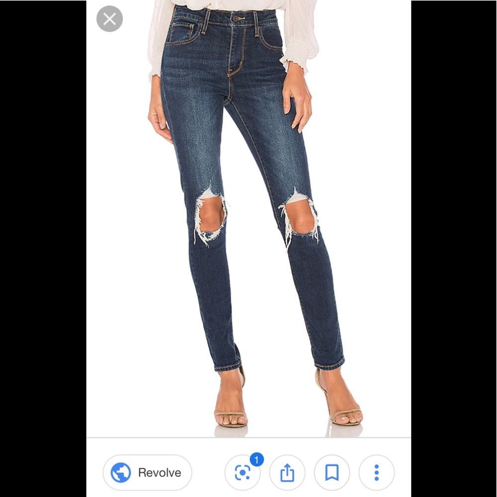Levi’s high rise skinny 721 Dark wash torn knees